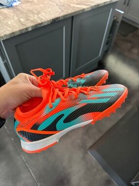 Messi 3 soccer shoes.